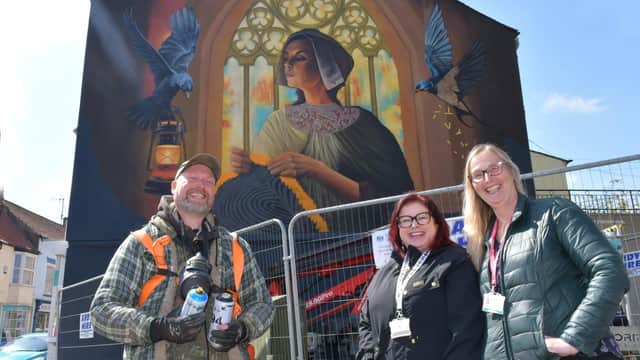 In front of the striking Gansey Girl mural in Bridlington’s Old Town artist Sam Porter, Angela Merrills (local growth coordinator at East Riding of Yorkshire Council), and Fiona Turner (project coordinator at the council).