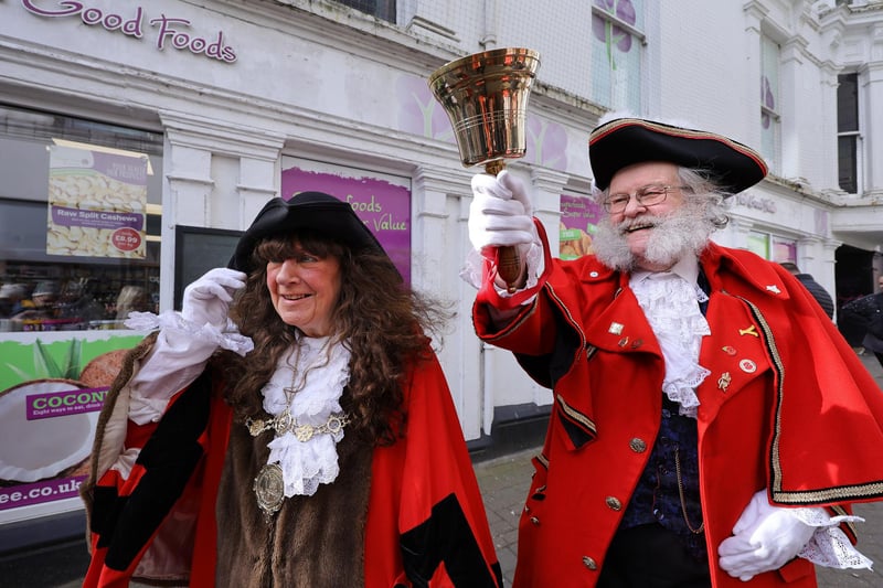 Pancake Races await as Mayor Janet Jefferson and Town Crier David Birdsall finish the bell ringing