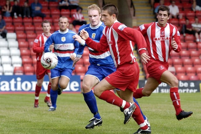 Do you recognise any of the Scarborough FC or Whitby Town players in this friendly at McCain Stadium in August 2006?.