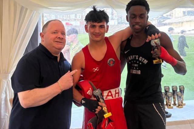 Paul Ingle with victorious Scarborough ABC player Logan Miah (red kit) and Kassim Nije. Photo by Glen Watkin Images