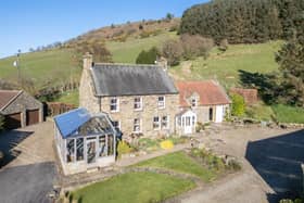 The stone-built farmhouse has a fabulous location looking over its own land and National Park countryside.