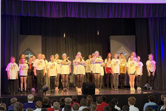 The We Will Rock You production in full flow.
