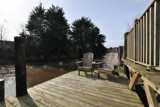 Relax and enjoy the views by the river on private decking that leads directly to the water.