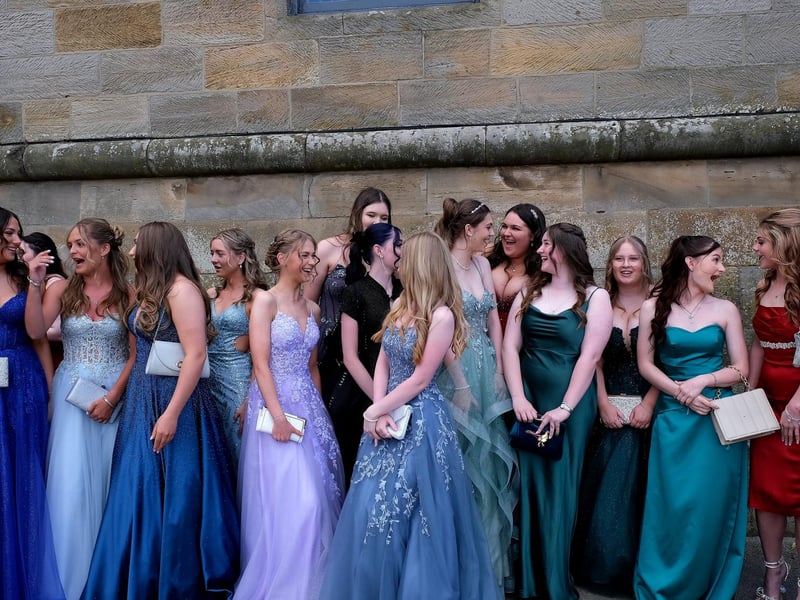 Girls enjoying a chat before the prom gets under way.