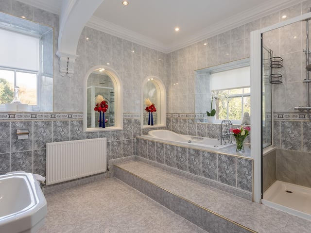 One of several stylish bathrooms within the property.
