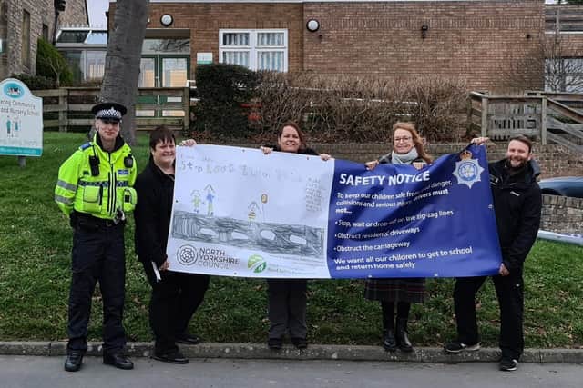 The new banners will highlight road safety around schools