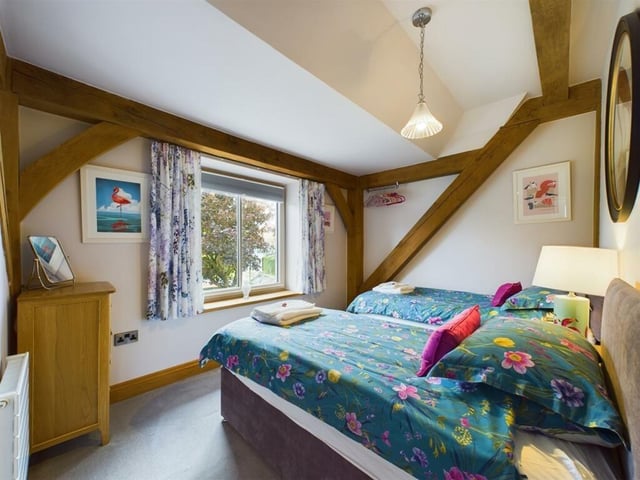 Another of the property's five bedrooms.