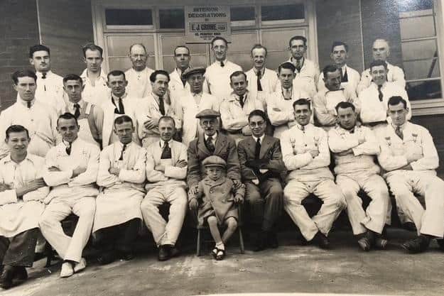 Eddie Pickering sitting with his grandad Edward Crowe, who was on the new Scarborough Hospital board.