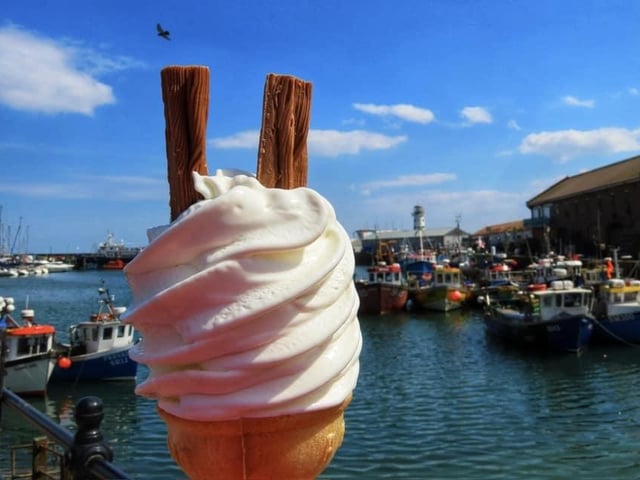 Enjoying an ice cream on the harbour.