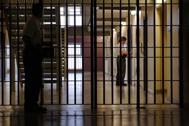 Prison Guards make last minute checks to the Woman's wing.
