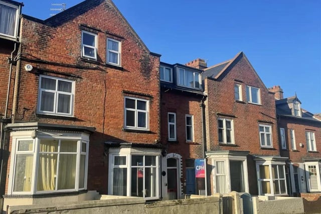 This seven bedroom and three bathroom mid-terrace home is currently for sale with CPH for £200,000.