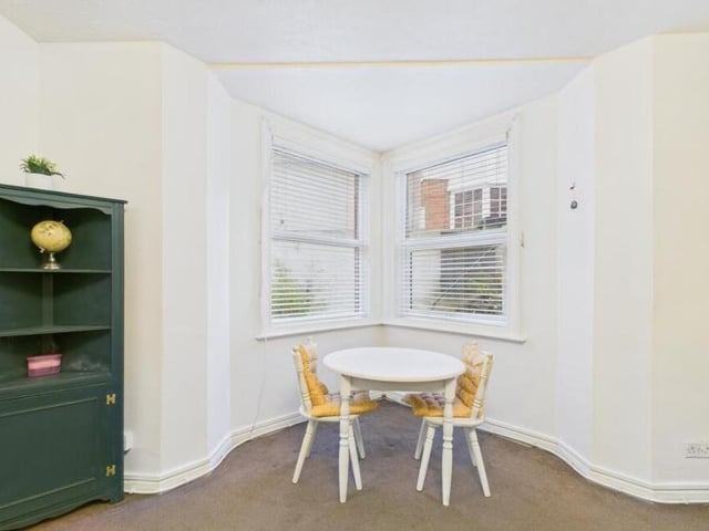 A quaint dining area or flexible space for alternative uses.