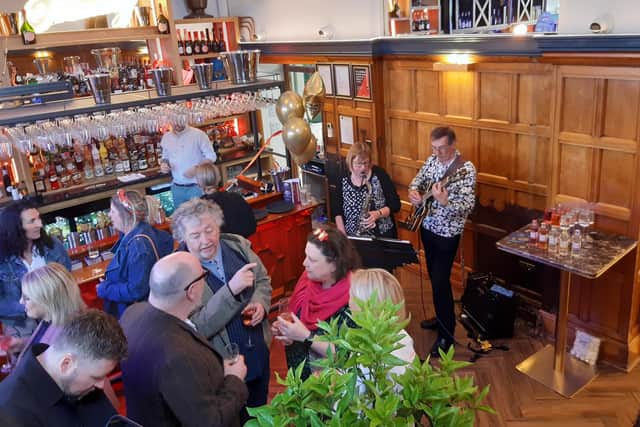Guests and live music at the launch of The Treasury in Whitby.