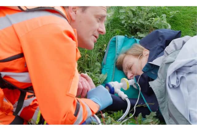 Gillian receives pain relief on the cliff tops