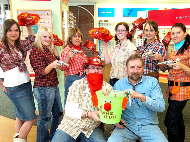 Raising money for Comic Relief are L-R Cowgirls, Neacy Yeadon, Dee Wood, Sarah Dowson, Sarah Whiteley, Floss Pearson and Sarah Locker. With Directors L, Dikki Finn and Norman Cole, w071127a