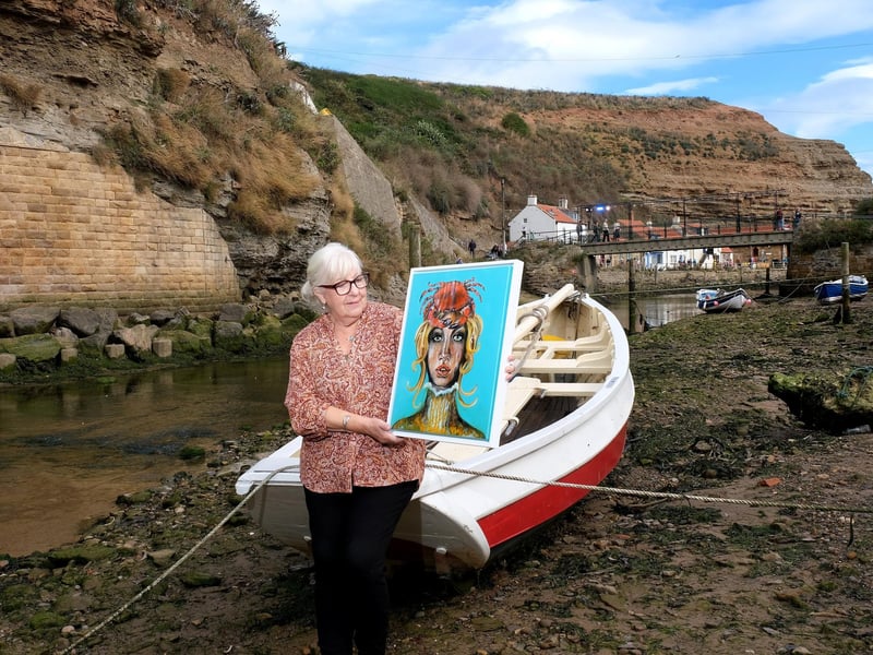 Artist Di Wright with her work.