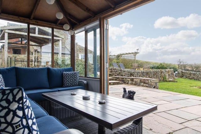 The summerhouse and patio have uninterrupted views.