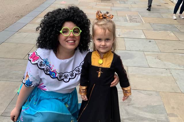 Mirabel poses with a princess
