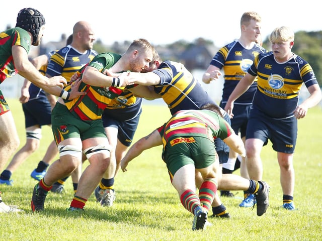 The hosts Brid look to stop Selby RUFC.