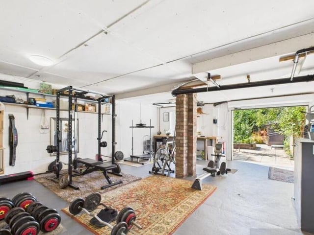 Adaptable garage, workshop, gym or hobby space.