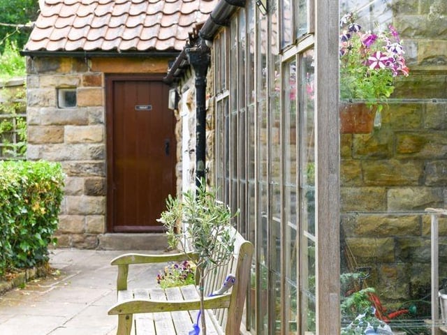 There is a useful range of stone outbuildings and a hardwood greenhouse.