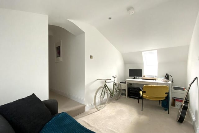 A versatile room suitable as a home office or a dressing room.