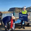 Fishermen stage demonstration in Whitby to raise awareness of shellfish deaths.