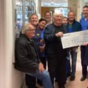 Front from left: Nearly famous band members Jonty Hartley, Pete Liley Pete Jackson; back: Bob Woodyatt; centre: nurses from Scarborough Macmillan Chemo Unit. 
Members not featured Pete Hudson and Paul Murray (DJ).