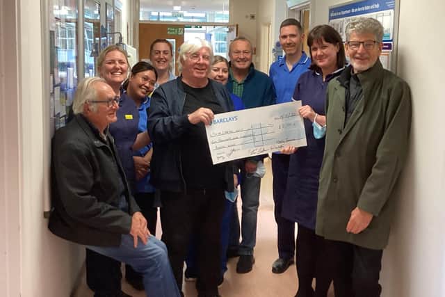 Front from left: Nearly famous band members Jonty Hartley, Pete Liley Pete Jackson; back: Bob Woodyatt; centre: nurses from Scarborough Macmillan Chemo Unit.
Members not featured Pete Hudson and Paul Murray (DJ).