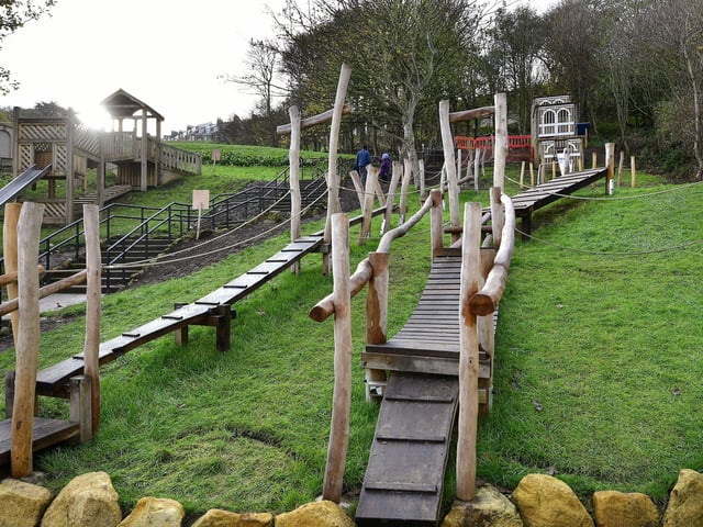 Ramps, walkways and ladders link the tower and play structures together.