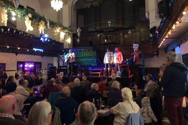The Chancy Brothers performing on stage at Whitby's Chapel on the Hill.
