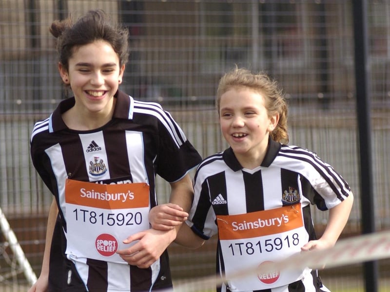 Making a dash for it in the three-legged race at the Sport Relief Mile fun run at Caedmon School.