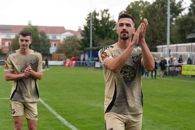 Will Thornton and Luca Colville applaud the travelling Boro fans after the FA Cup win at Warrington Rylands. Photo by Wandering Photography