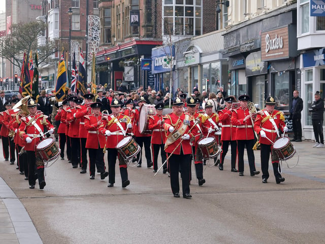 The march down Westborough for the Planting of the Crosses Ceremony at Alma Square.