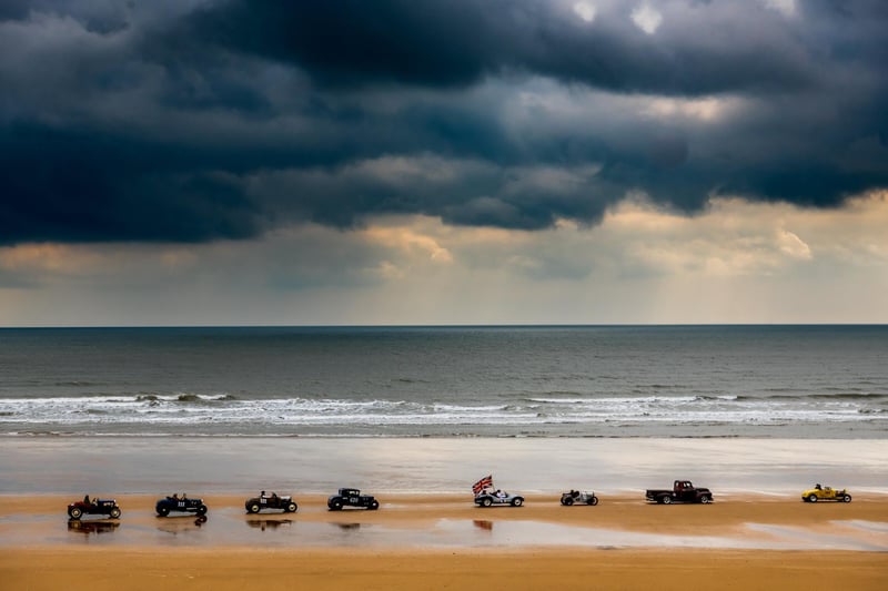 This years The Race the Waves Vintage Beach Race festival held on Bridlingon's south beach with over one hundred competitors taking part in the event from the early years of coastal motor racing to post-war American hot-rodders and drag racing culture. Picture By Yorkshire Post Photographer, James Hardisty. Date: 22nd April 2023.