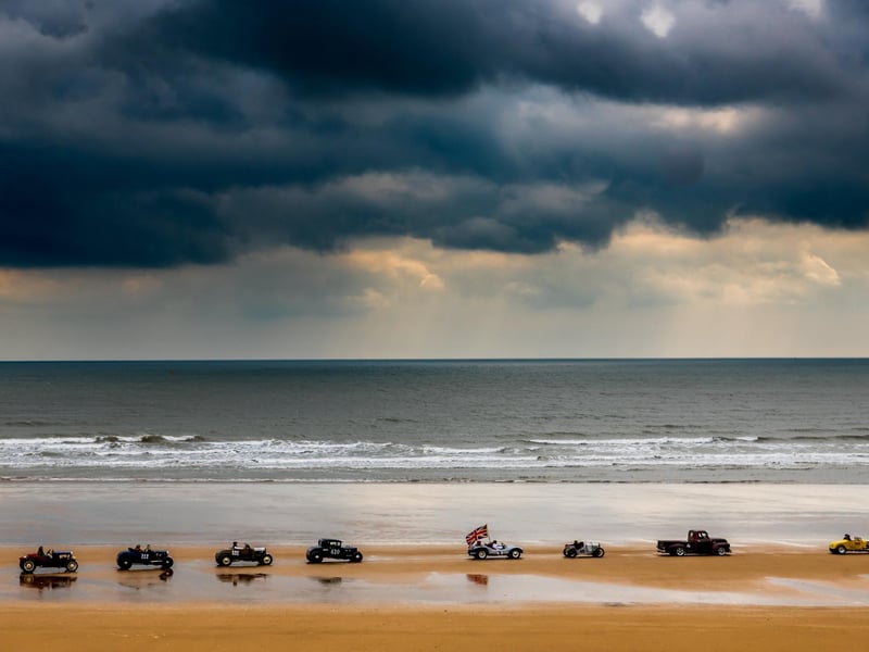 This years The Race the Waves Vintage Beach Race festival held on Bridlingon's south beach with over one hundred competitors taking part in the event from the early years of coastal motor racing to post-war American hot-rodders and drag racing culture. Picture By Yorkshire Post Photographer, James Hardisty. Date: 22nd April 2023.