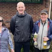 Borough President Andy Adamson presents Robin Daplyn and Sue Wilkinson with their prizes.