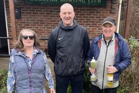 Borough President Andy Adamson presents Robin Daplyn and Sue Wilkinson with their prizes.