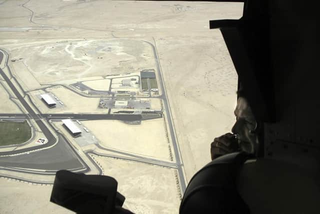Philip Speechly's photograph of Andreas Gursky on the helicopter during the photoshoot.
