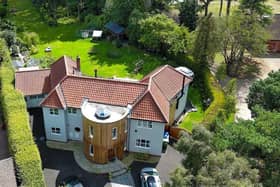 The impressive Scalby property has 0.75 acres of garden and woodland.
