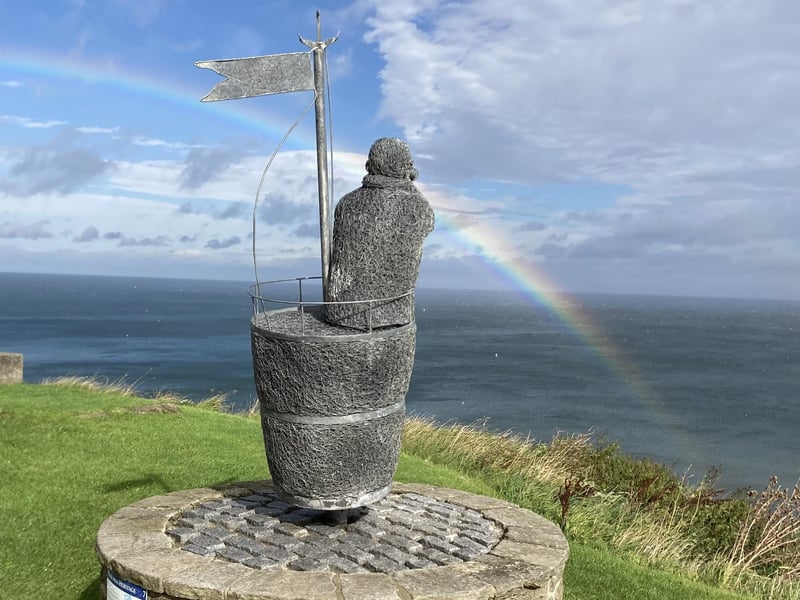 Scoresby checking out a rainbow, by Graham Templeton.