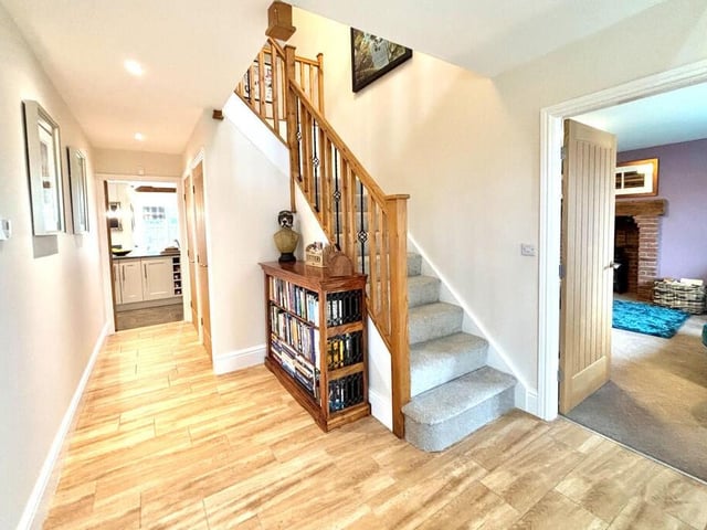 A bright and spacious hallway leads in to the property.