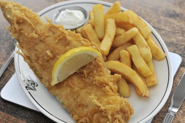 Whitby is renowned for its delicious fish and chips. Head to a local fish and chip shop, such as the Magpie Café, and savor this classic British dish.