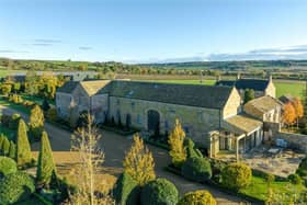 The stunning property within landscaped gardens has views that extend for miles across rural North Yorkshire.