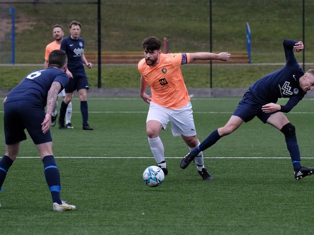 Joe Gallagher, the Edgehill captain, on the attack against Haxby Town