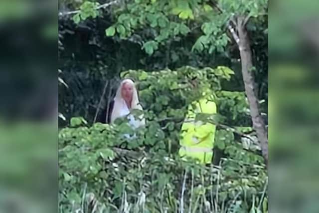 the mysery on the ‘ghost’ has been debunked as one Facebook user shared another image of the ‘ghost’, and it appears it was a woman with blonde hair and a white t-shirt on whilst walking her dog.