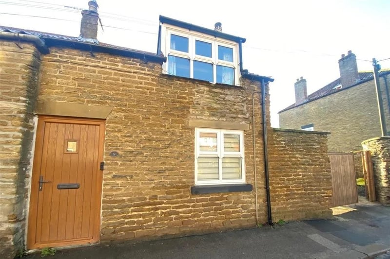 This two bedroom and one bathroom end terrace house is for sale with Ellis Hay for £205,000