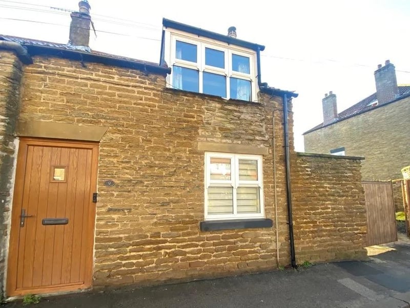 This two bedroom and one bathroom end terrace house is for sale with Ellis Hay for £205,000