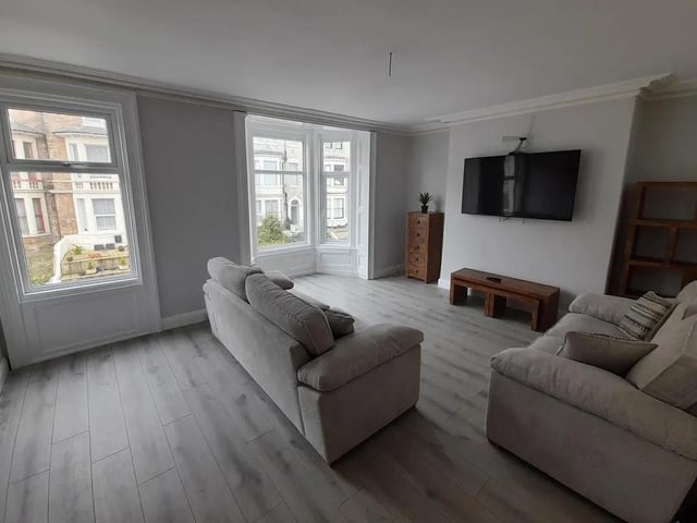 The flat has a large living room, which is bright with large picture windows in white, also with recently installed UPVC.