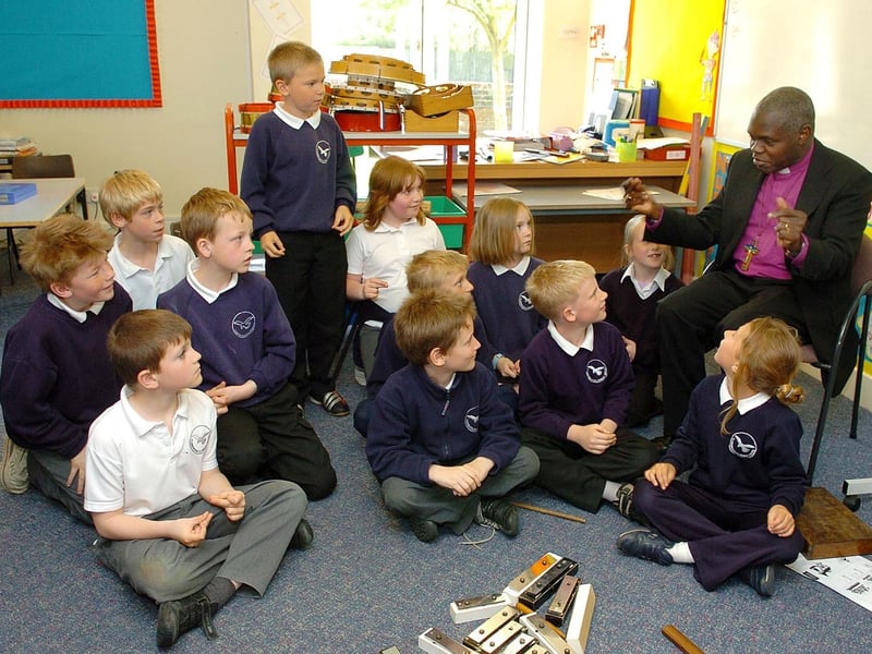The Archbishop of York, Dr John Sentamu, talks to local children in 2006. (PA0619-4m)
